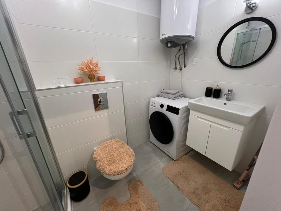 Bathroom, towels, washing machine, dryer