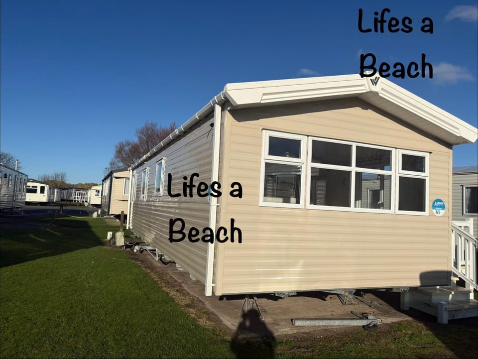 Lifes a Beach on Presthaven Sands House in Llanasa