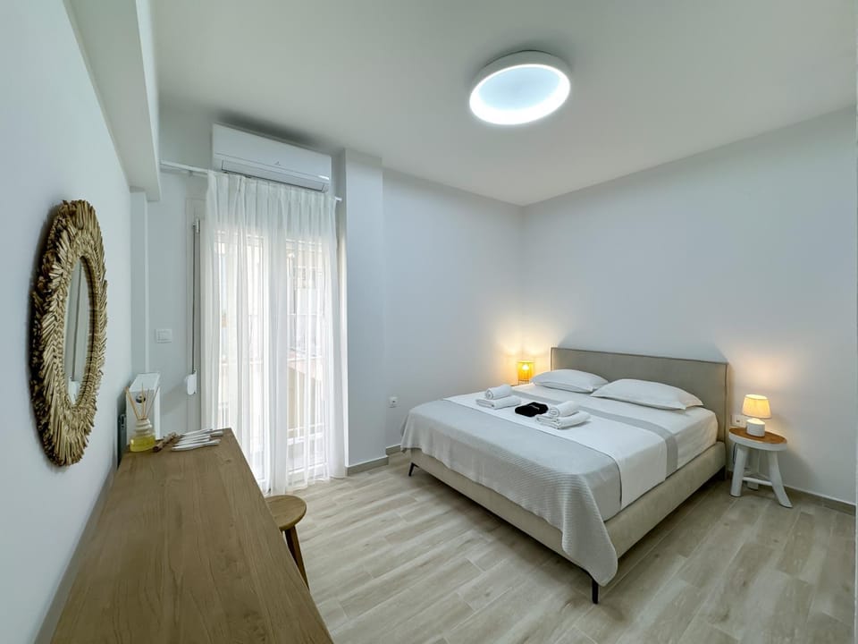 Bed, Photo of the whole room, Bedroom, towels, air conditioner