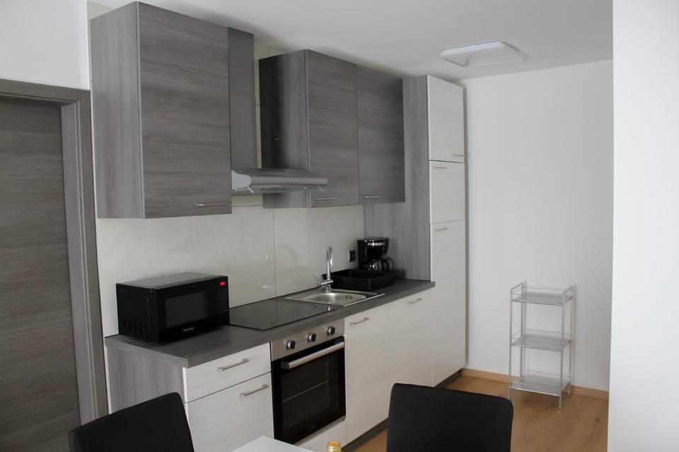 Kitchen or kitchenette, oven, stove, toaster