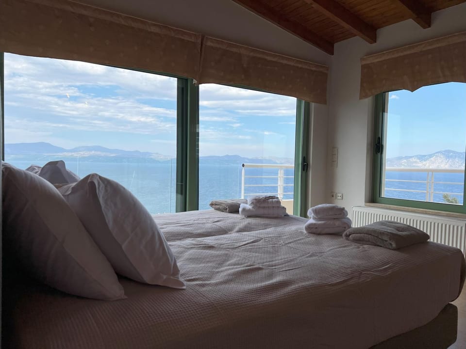 Bed, View (from property/room), View (from property/room), Bedroom, Mountain view, Mountain view, Pool view, Pool view, Sea view, Sea view, towels, towels