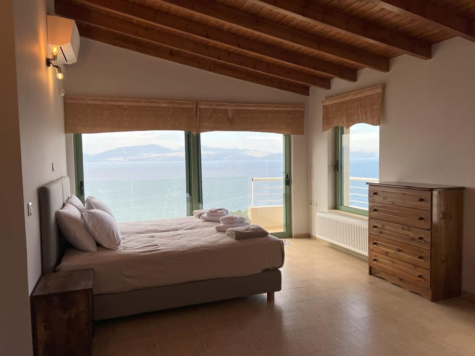Bed, View (from property/room), View (from property/room), Balcony/Terrace, Balcony/Terrace, Bedroom, Mountain view, Mountain view, Pool view, Pool view, Sea view, Sea view, wardrobe, air conditioner