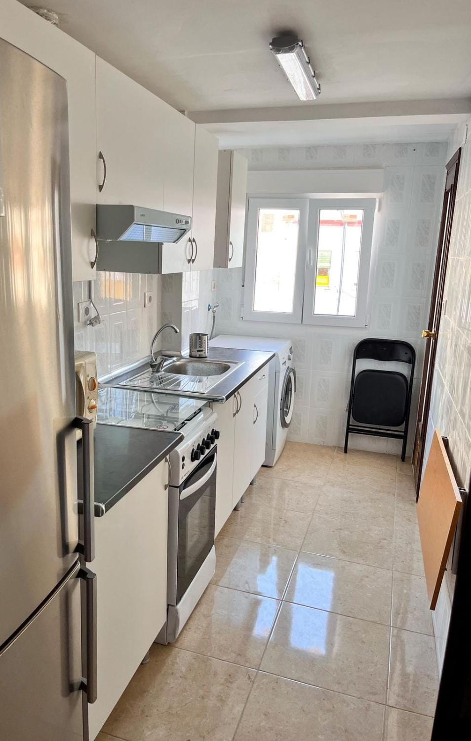 Kitchen or kitchenette, oven, stove