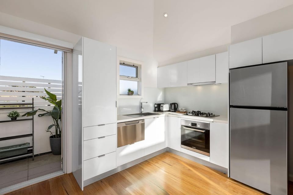 Kitchen or kitchenette, dishwasher, oven, stove, toaster