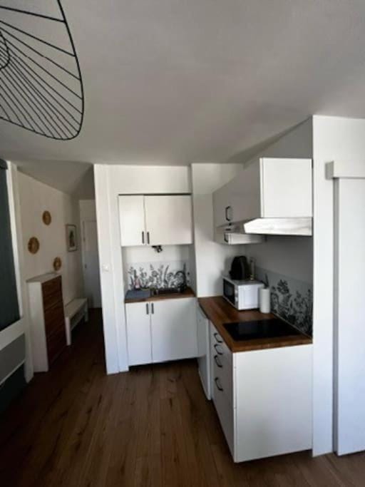 Kitchen or kitchenette, stove