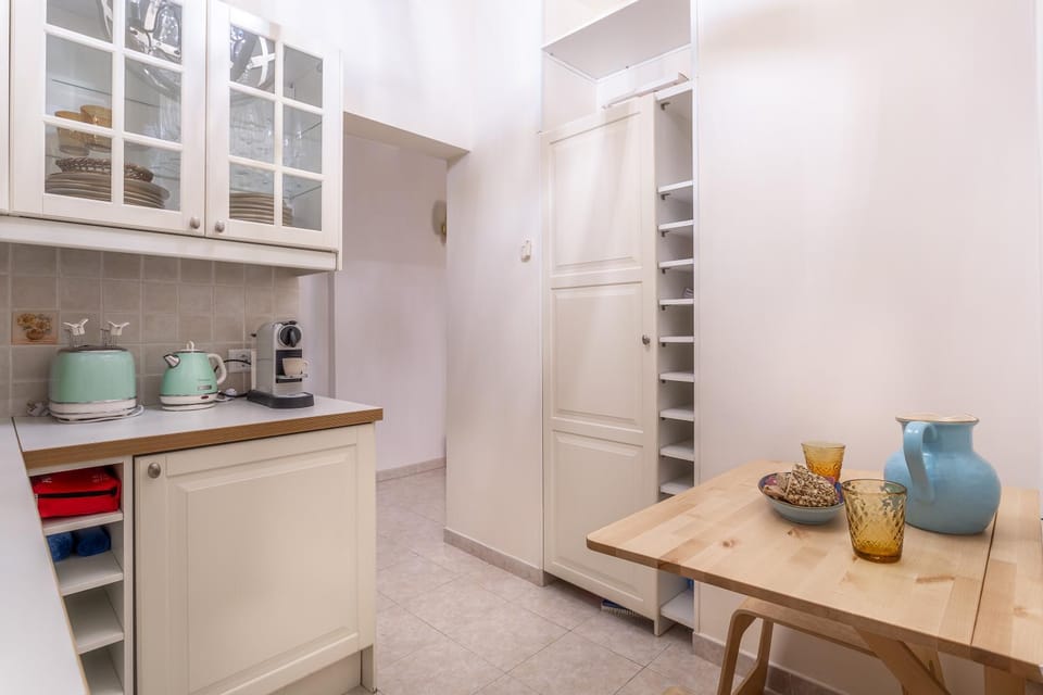 Kitchen or kitchenette, stove, toaster