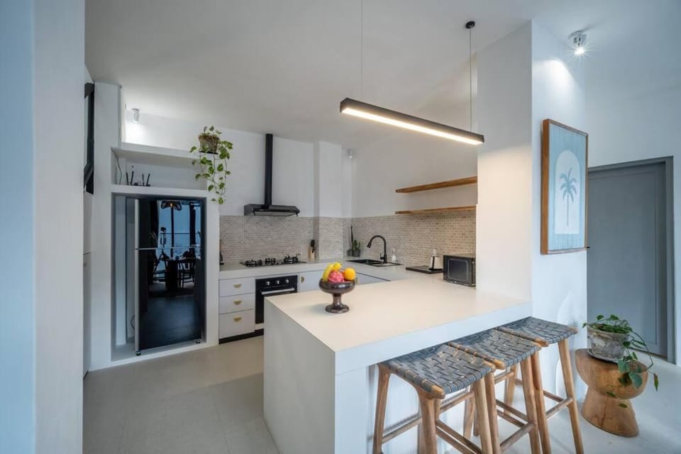 Kitchen or kitchenette, dishwasher, oven, stove