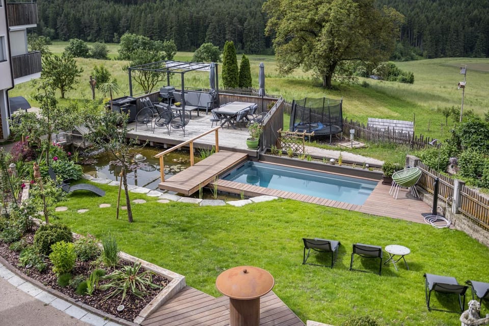 Property building, Living room, Swimming pool