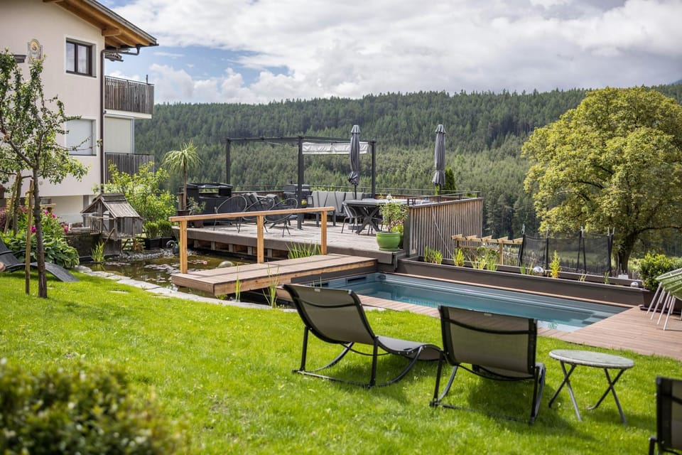 Property building, Living room, Swimming pool