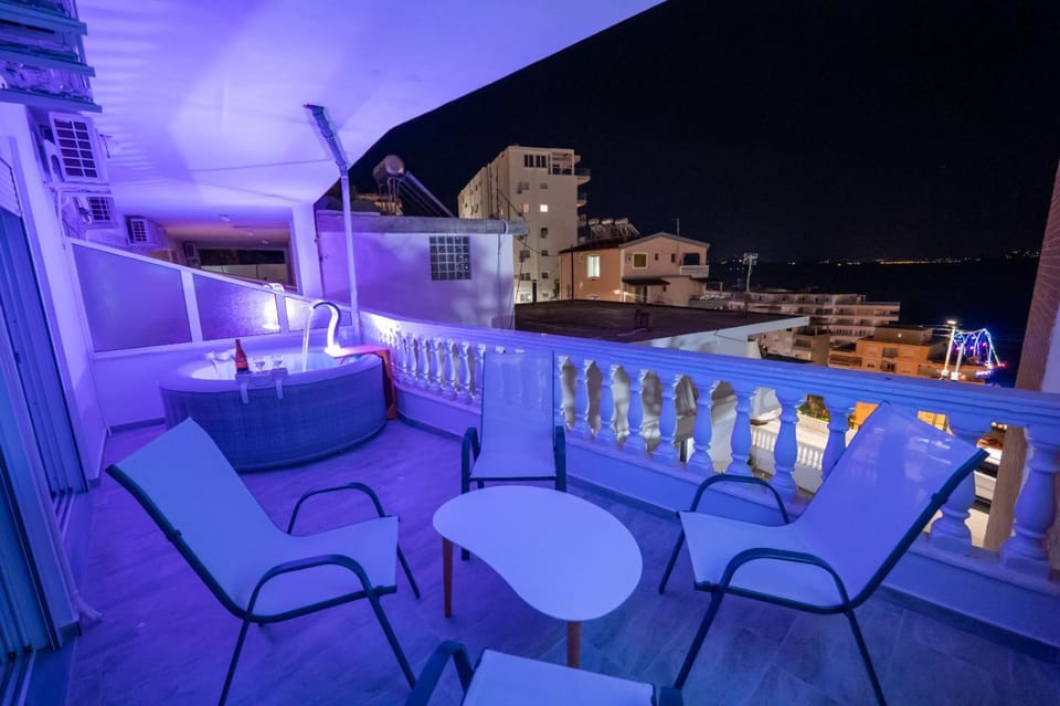 Night, View (from property/room), Balcony/Terrace, Seating area, Dining area, City view, Sea view