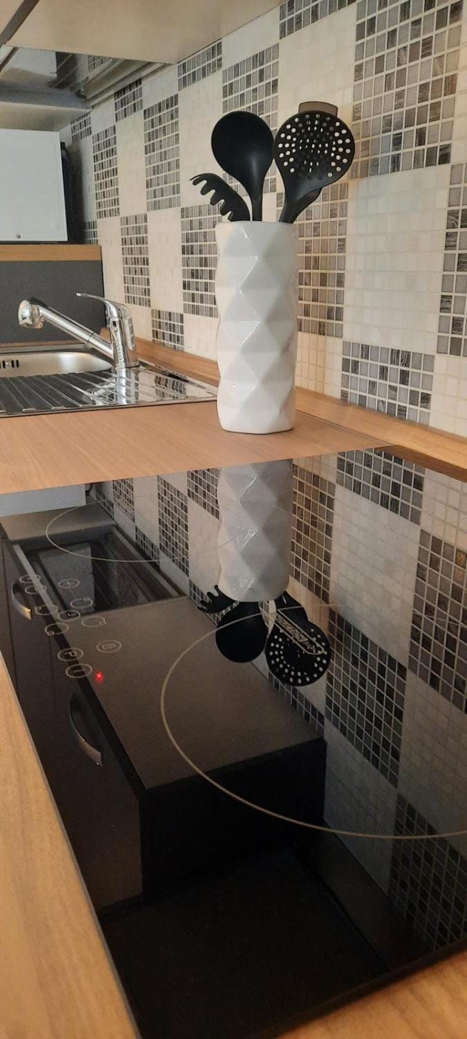 Kitchen or kitchenette, stove
