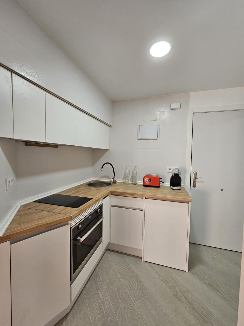 Kitchen or kitchenette, oven, stove, toaster