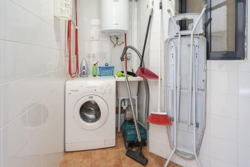 Kitchen or kitchenette, washing machine