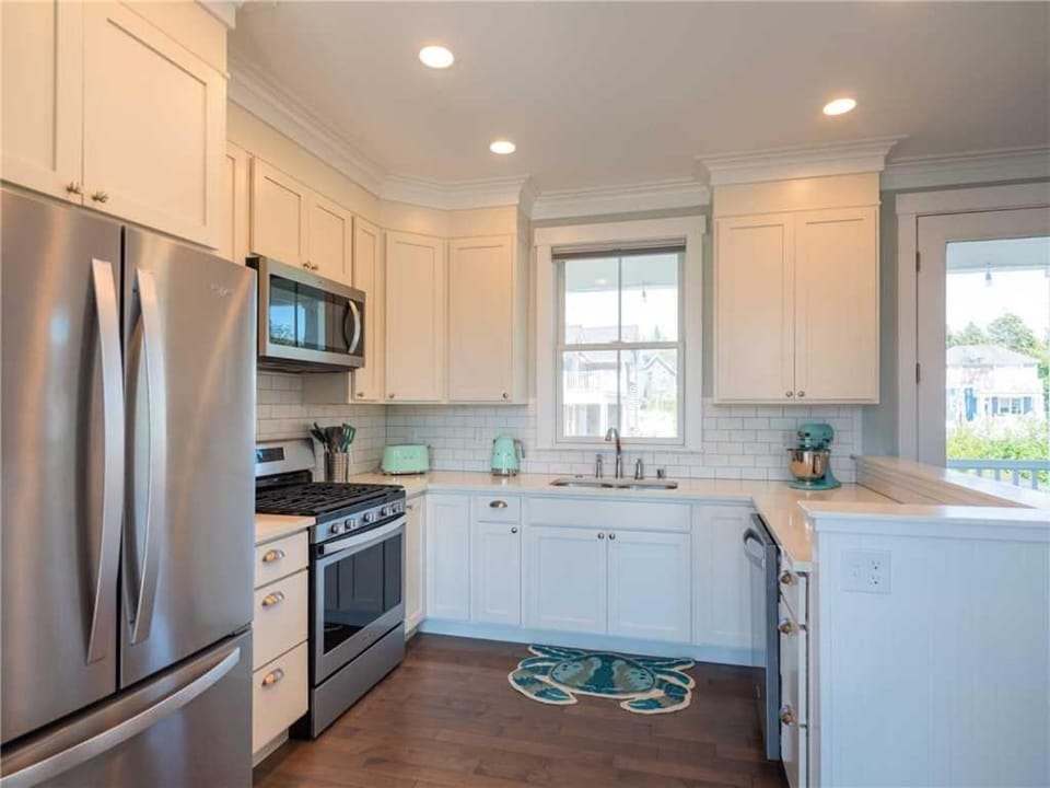Kitchen or kitchenette, dishwasher, oven, stove, toaster