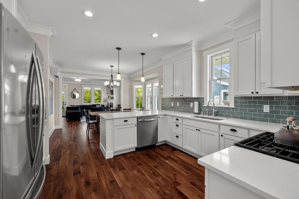 Kitchen or kitchenette, dishwasher, oven, stove