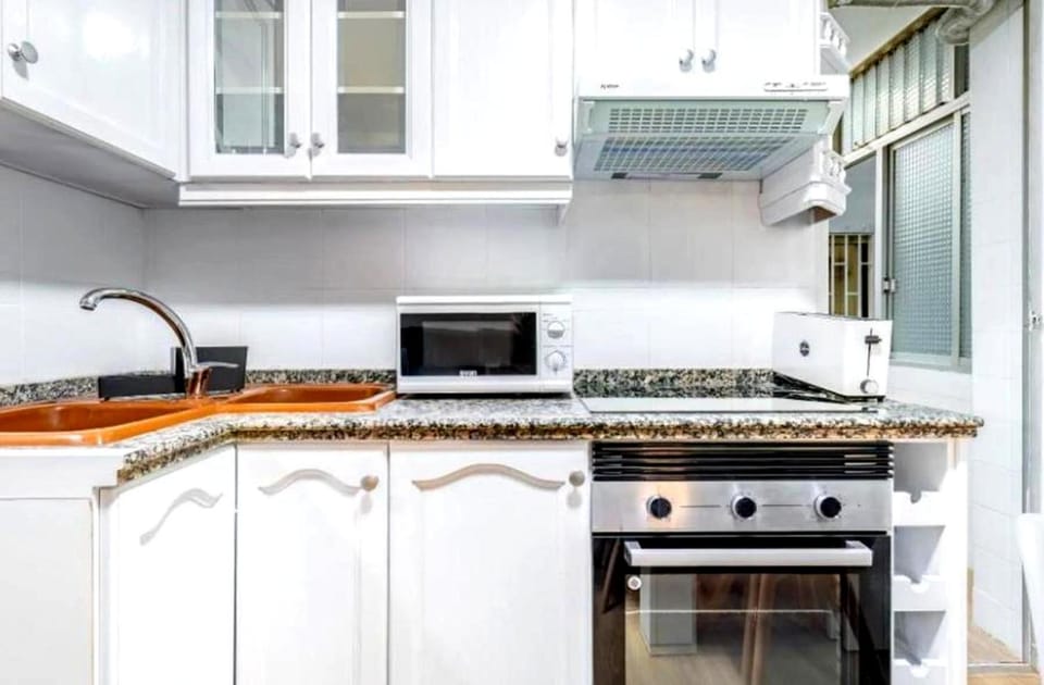 Kitchen or kitchenette, stove