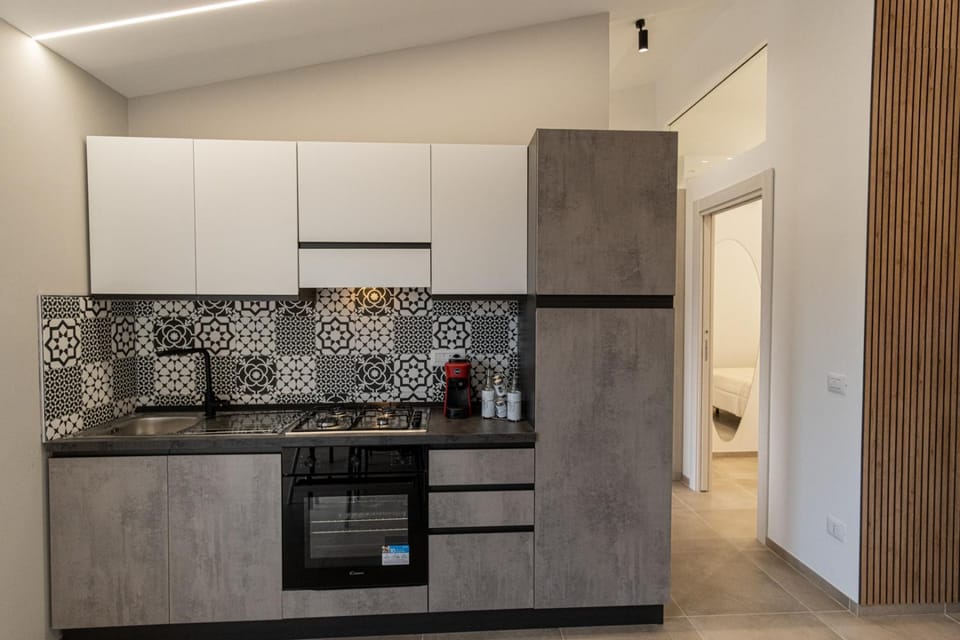 Kitchen or kitchenette, oven, stove