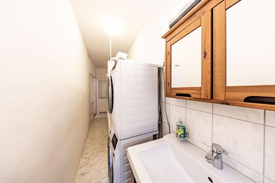 Bathroom, washing machine, dryer