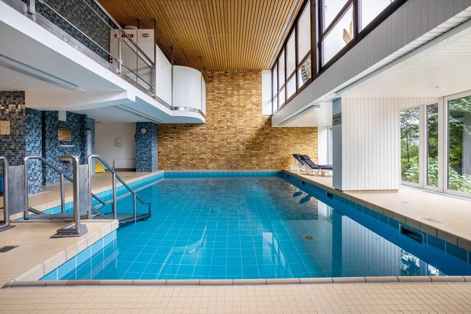 Property building, Living room, Swimming pool