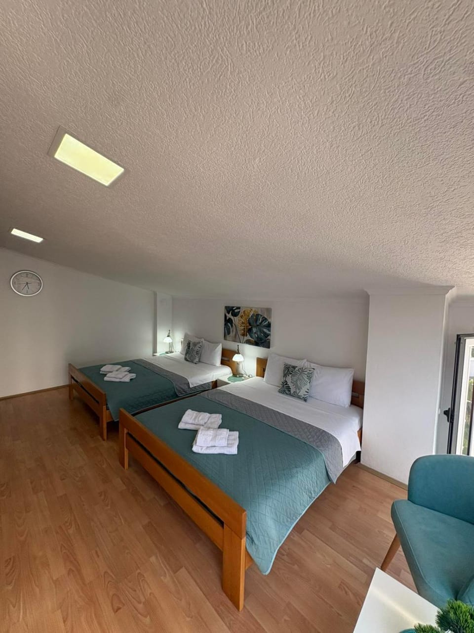 Bed, Seating area, Bedroom, towels, wardrobe