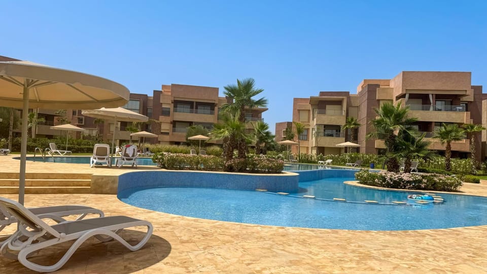 Property building, Patio, Day, Pool view, Swimming pool