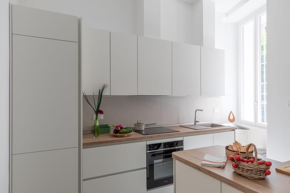 Kitchen or kitchenette, dishwasher, stove, toaster