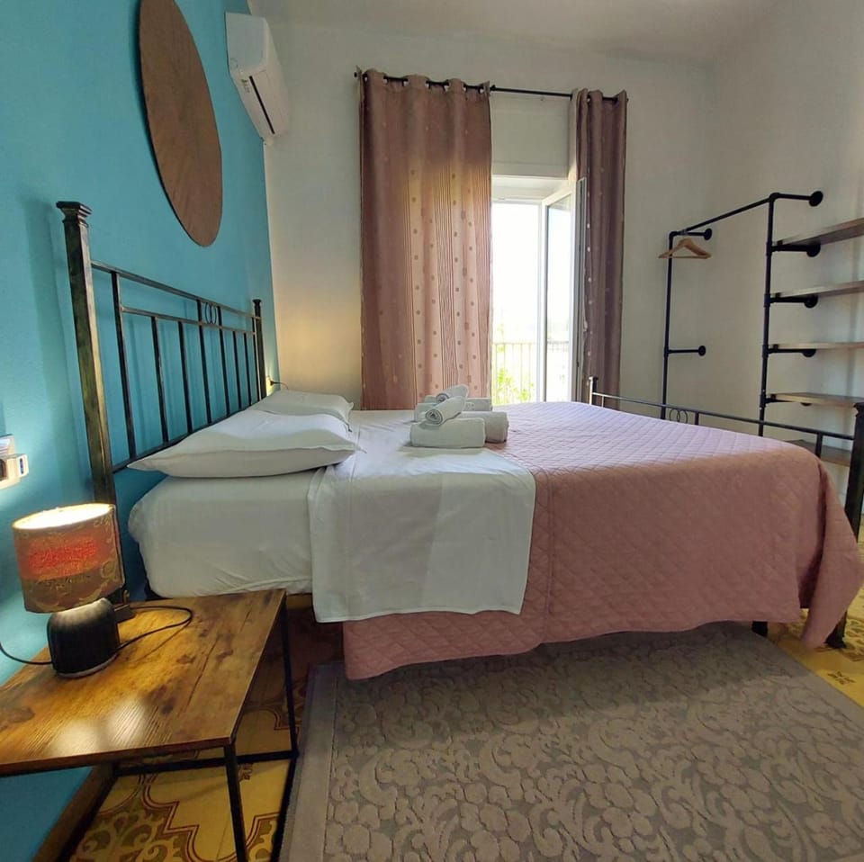 Bed, Balcony/Terrace, Decorative detail, Bedroom, locker, towels, air conditioner