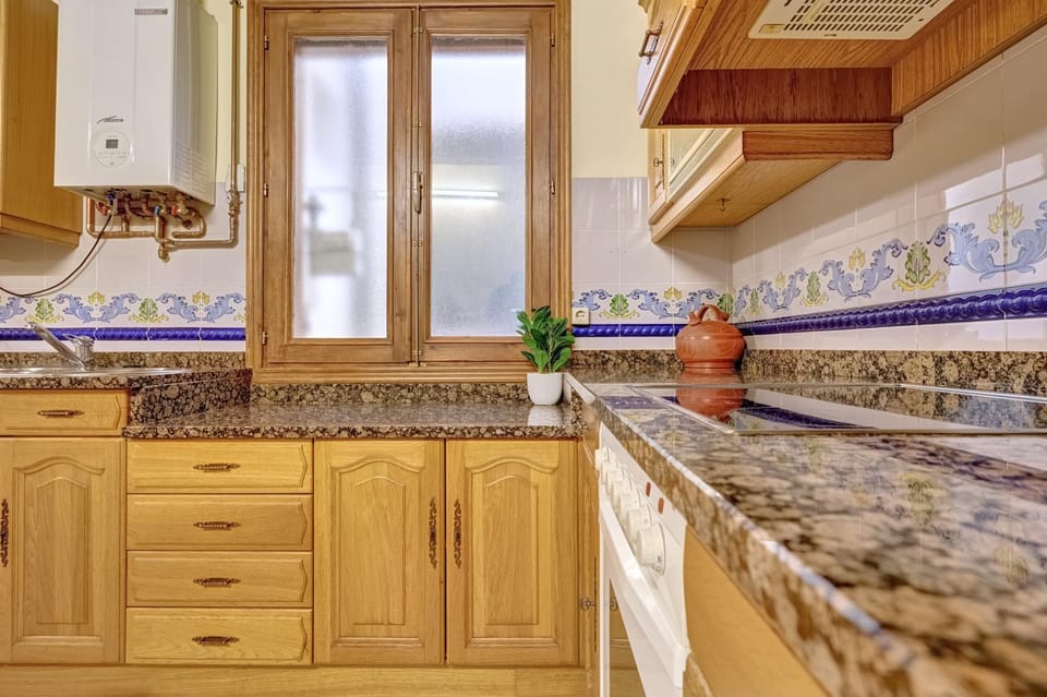 Kitchen or kitchenette, stove