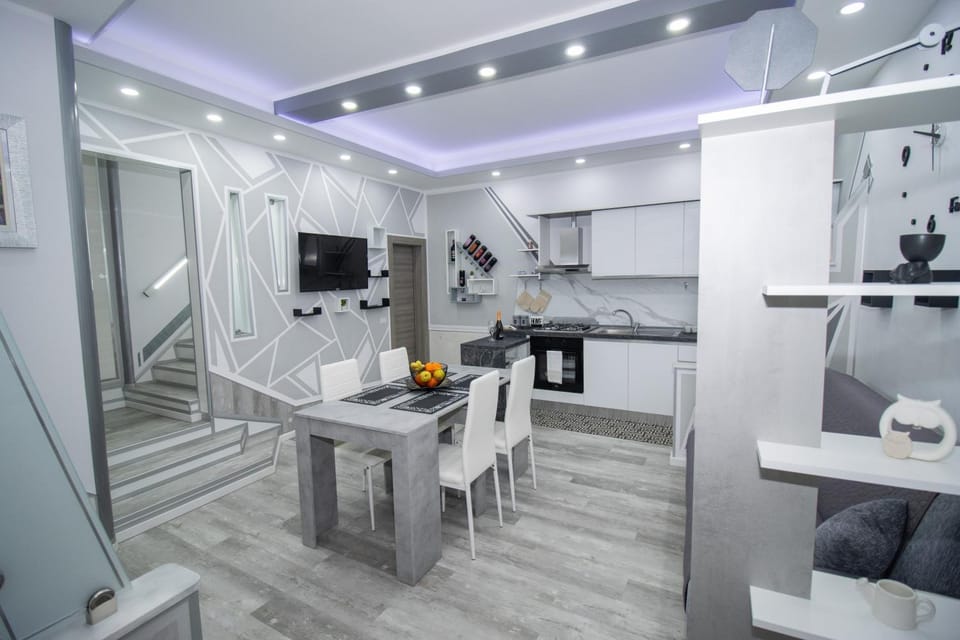 TV and multimedia, Kitchen or kitchenette, Living room, Seating area, Dining area, oven, stove