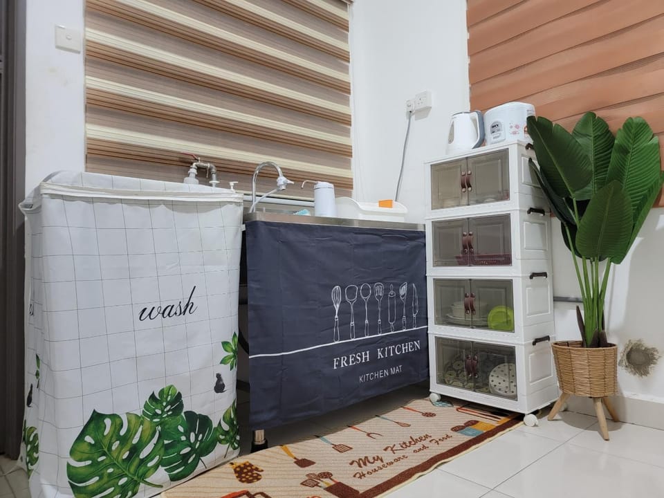 Kitchen or kitchenette, washing machine