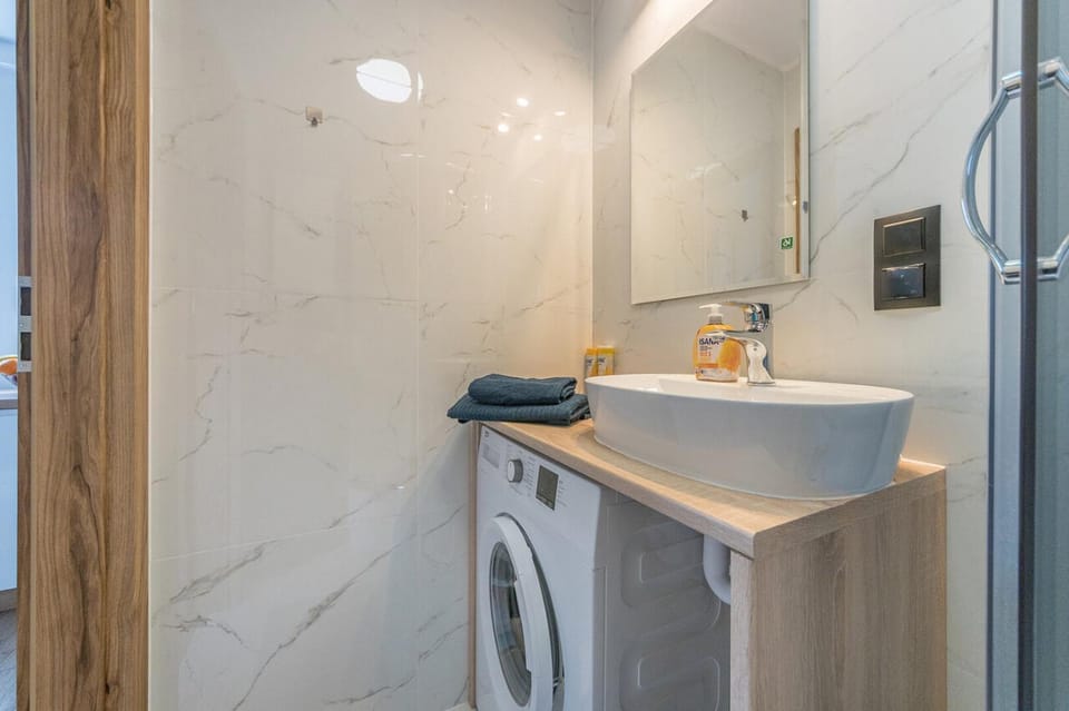Bathroom, towels, washing machine, dryer
