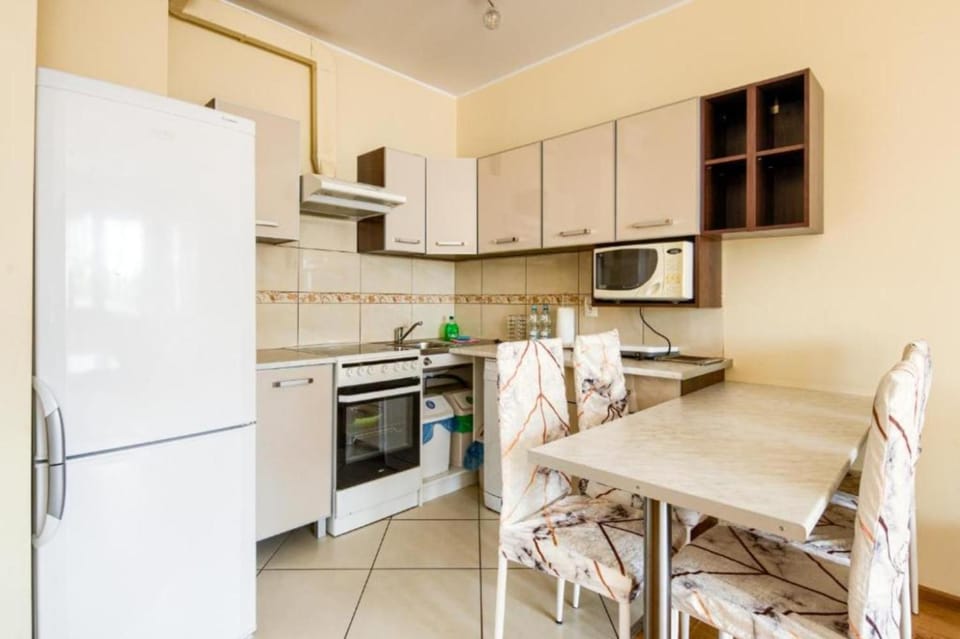 Kitchen or kitchenette, dishwasher, oven, stove