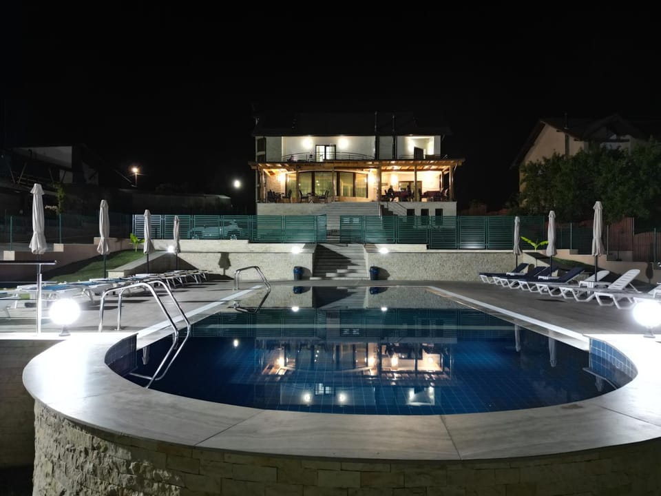Property building, Night, Swimming pool
