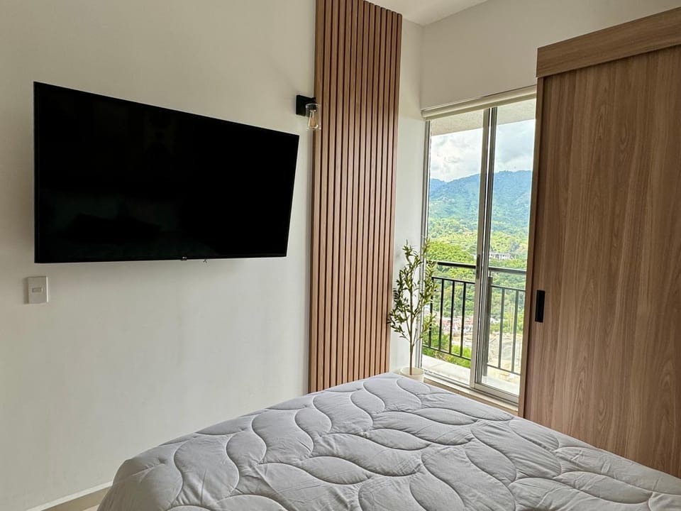 Bed, Natural landscape, TV and multimedia, Evening entertainment, Bedroom, Mountain view