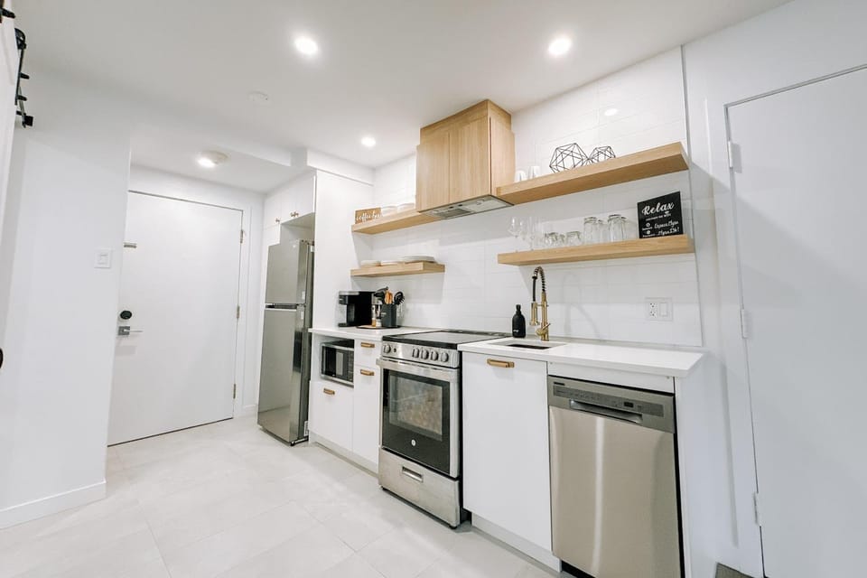 Kitchen or kitchenette, dishwasher, oven, stove