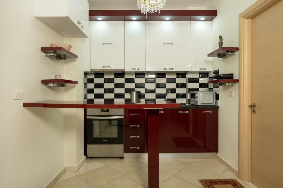 Kitchen or kitchenette, oven, stove