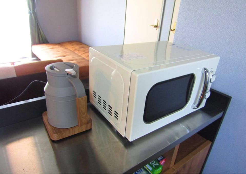 Kitchen or kitchenette, microwave