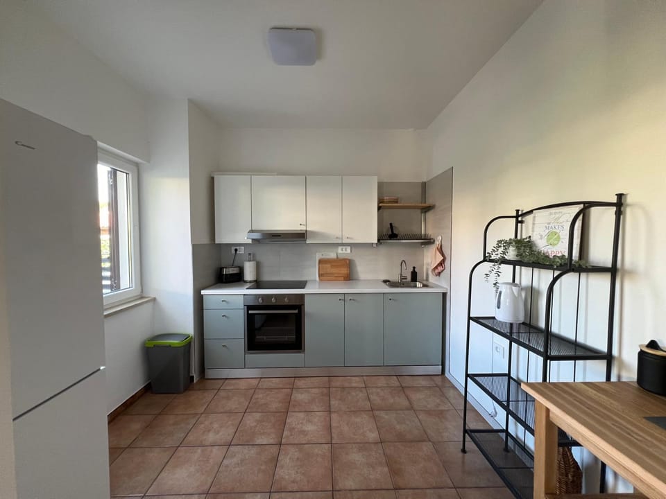 Kitchen or kitchenette, oven, stove, toaster