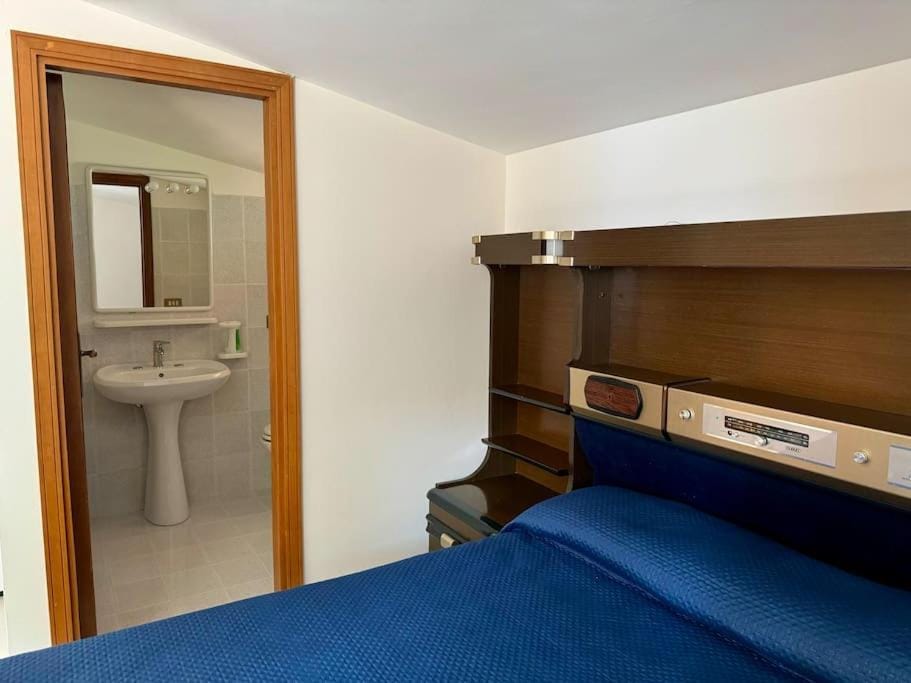 Toilet, Bed, Bathroom, Photo of the whole room, Bedroom