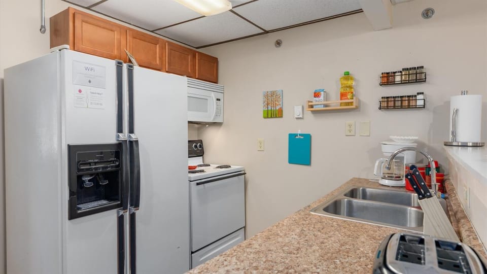 Kitchen or kitchenette, oven, stove, toaster