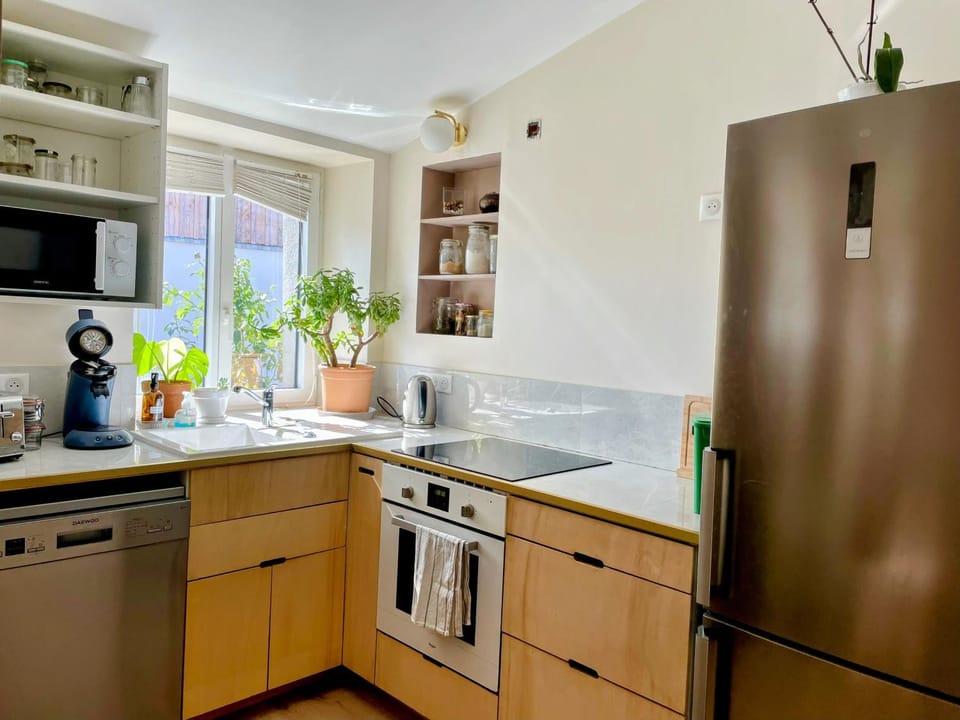 Kitchen or kitchenette, dishwasher, oven, stove, toaster