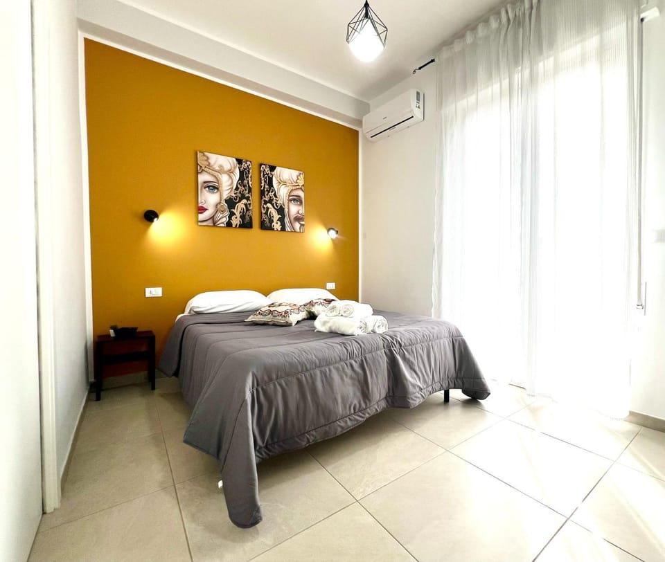 Bed, Photo of the whole room, Bedroom, towels, air conditioner