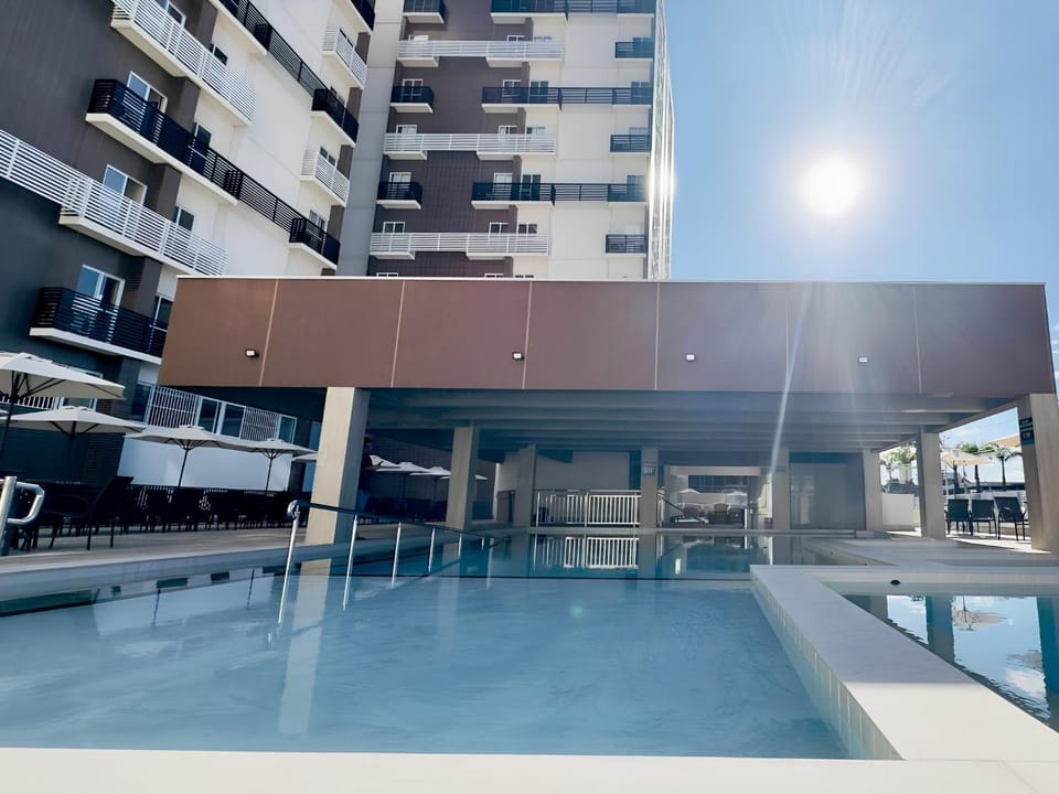 Property building, Patio, Day, View (from property/room), Pool view, Swimming pool, Swimming pool, sunbed