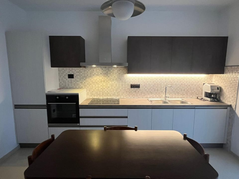 Kitchen or kitchenette, oven, stove