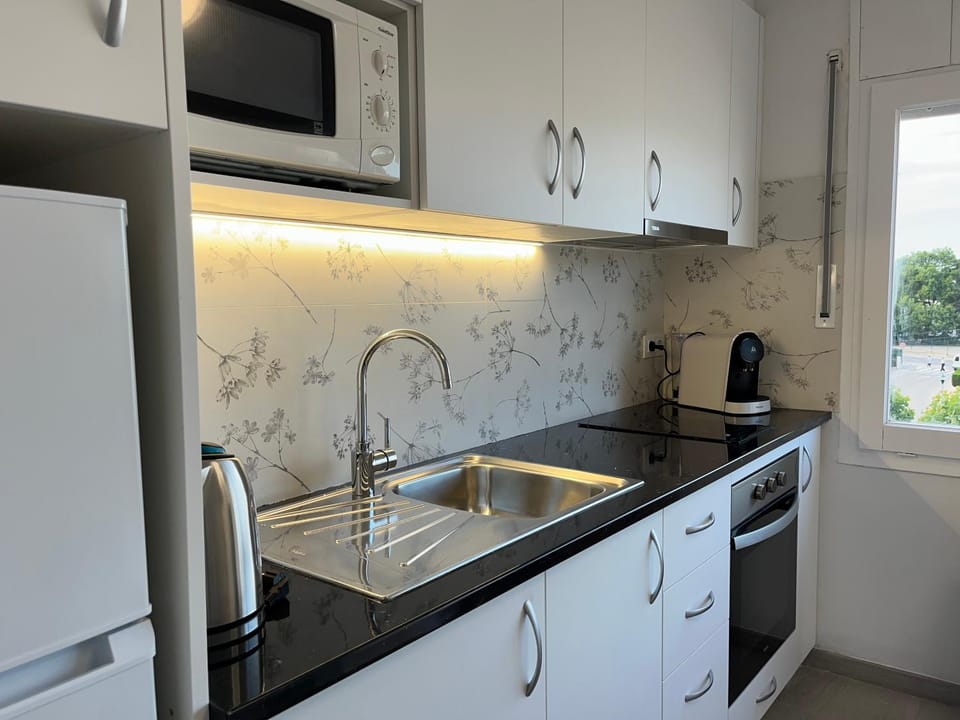 Kitchen or kitchenette, stove