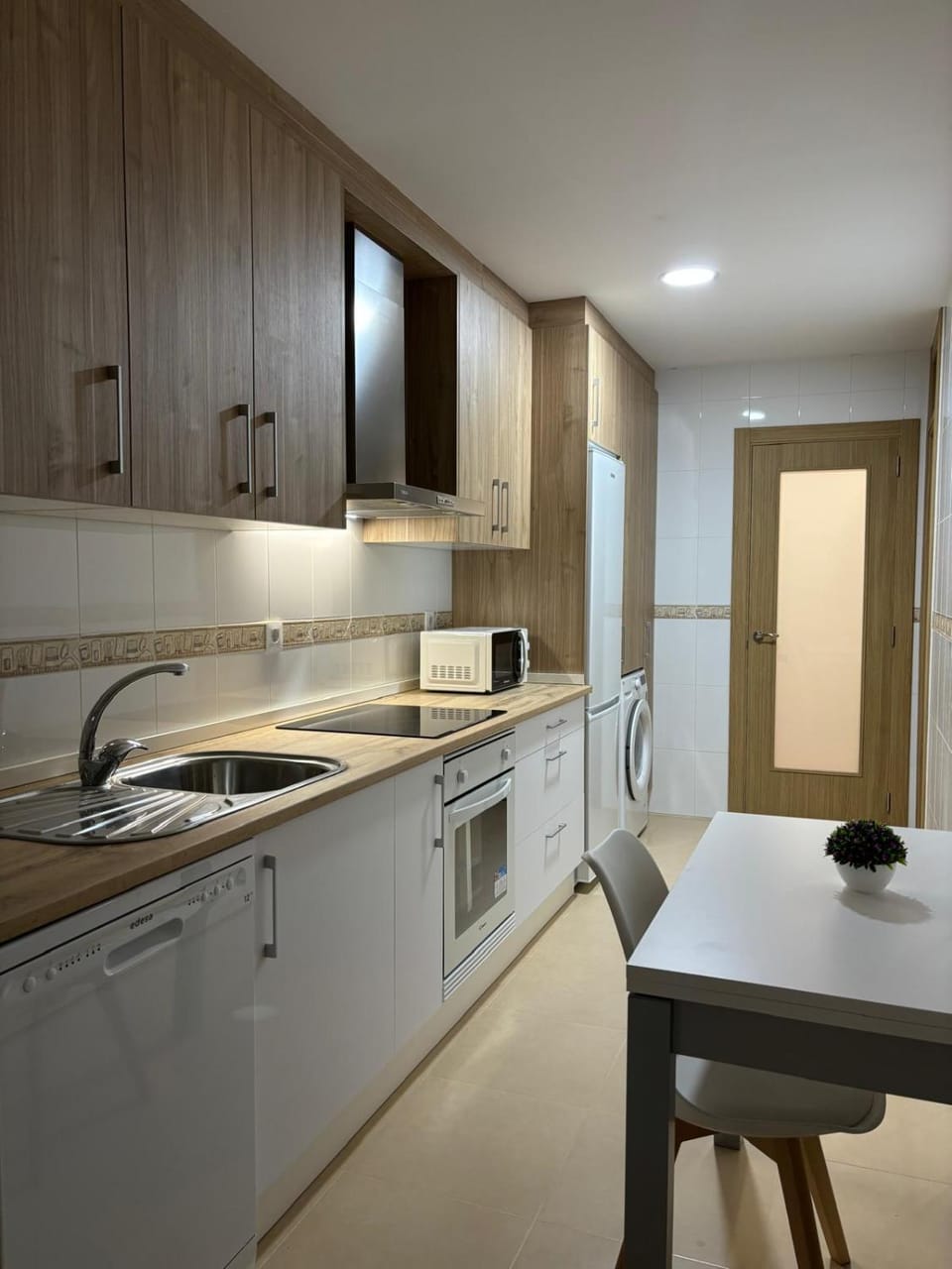 Dining area, dishwasher, oven, stove