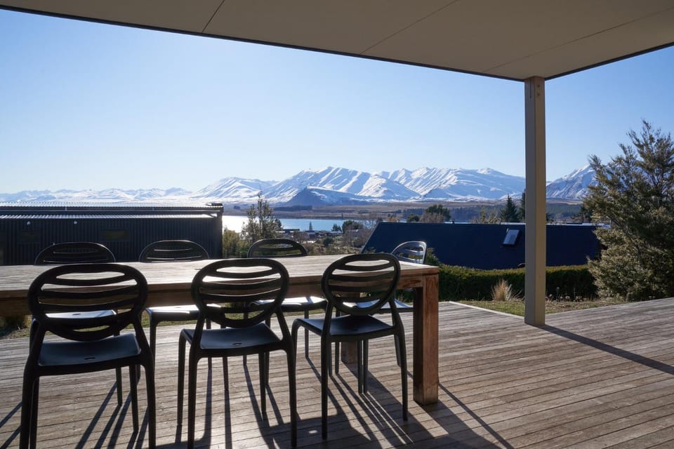 Property building, Patio, Dining area, Lake view, Mountain view