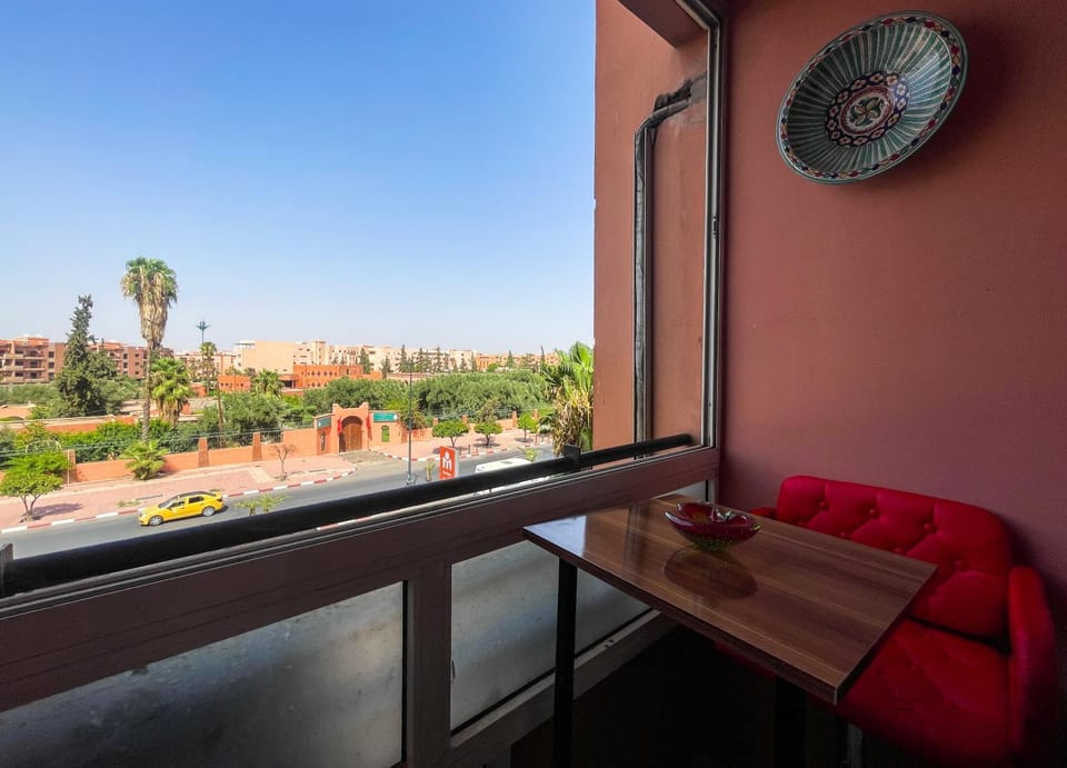 View (from property/room), Balcony/Terrace, Seating area, City view