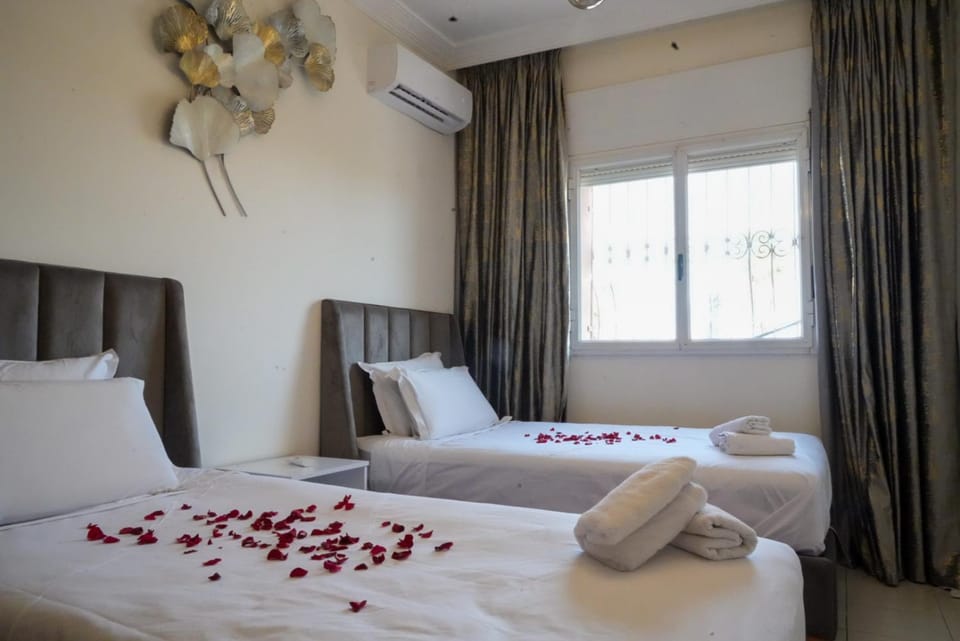 Bed, Photo of the whole room, Bedroom, towels, air conditioner