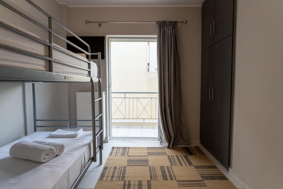 Bed, Photo of the whole room, Bedroom, bunk bed, towels, wardrobe